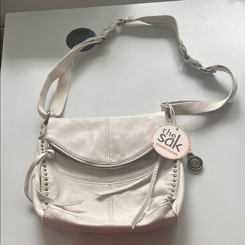 The Sak Cream Crossbody Bag with Decorative Stitching